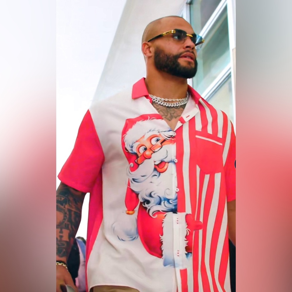 Dak Prescott SIGNED & Worn Christmas Game Santa Button Up Shirt
Red- XL